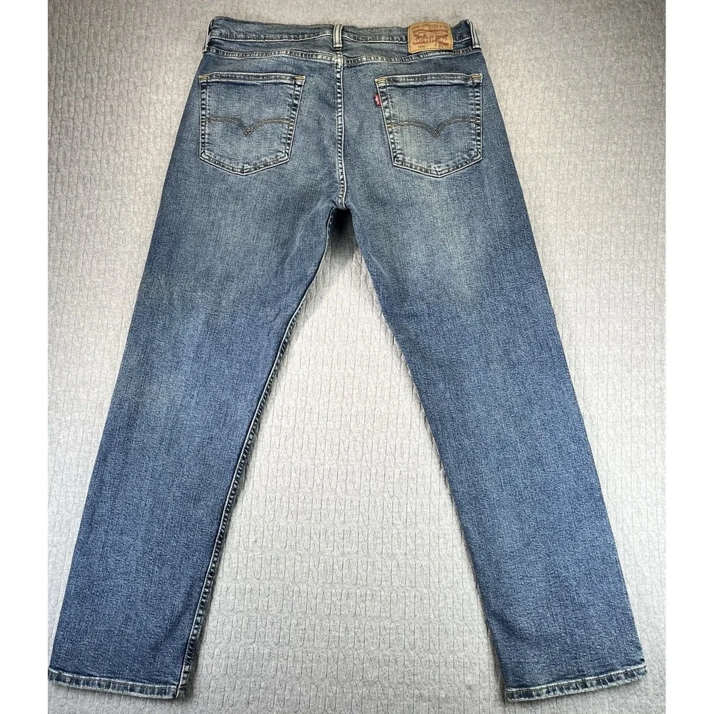 Levi's 505 Men's (34X31) straight leg, relaxed, fit medium wash blue jeans pants